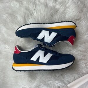 New Balance 237 Sneakers in Navy with White and Yellow Accents